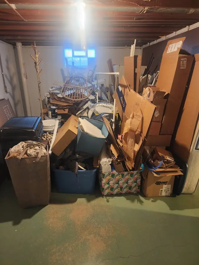 Roll-off dumpster container at job site for Construction Dumpster Rental in Tipton